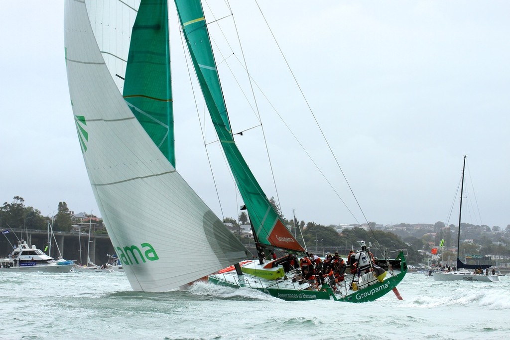 Groupama gets a big tow down to the leeward rounding mark - Volvo Ocean Race Auckland - Start March 18,2012 © Richard Gladwell www.photosport.co.nz